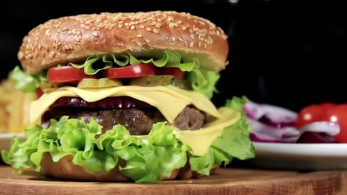 Close-Up of a Cheeseburger with Fries
