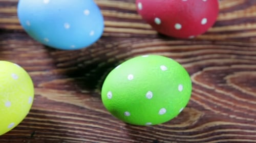 Painted Easter Eggs on Wooden Table
