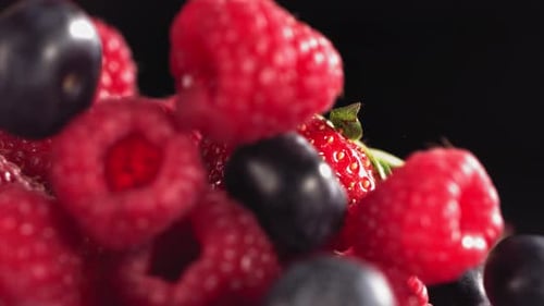 Fresh Berries Falling in Slow Motion