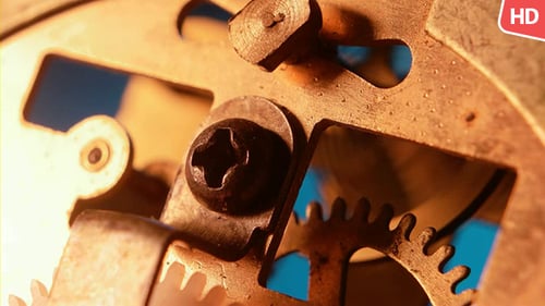 Intricate Gears Turning Inside an Antique Clock