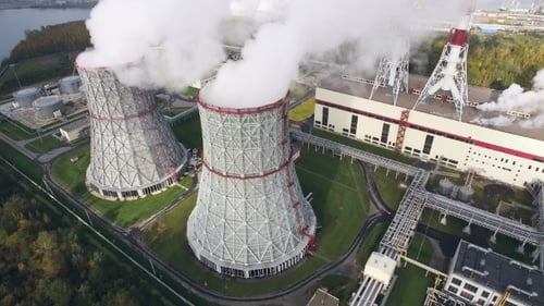 Aerial View Of Cooling Towers On Power Plant