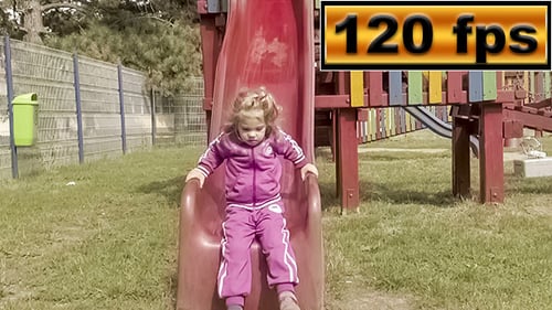 Happy Girl On Playground