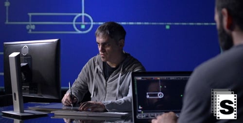 Software Developers Working Late on Coding Project