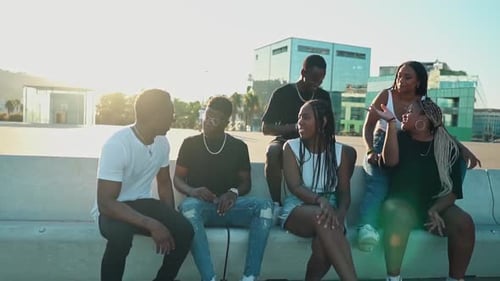 Group of Young Adults Talking in the City