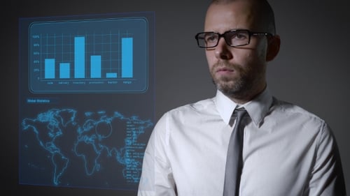 Future Work With Finance And Economy. Businessman Working With An Interactive Holographic Screen.