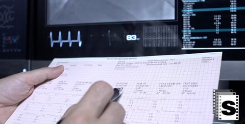 Doctor Checking Cardiogram