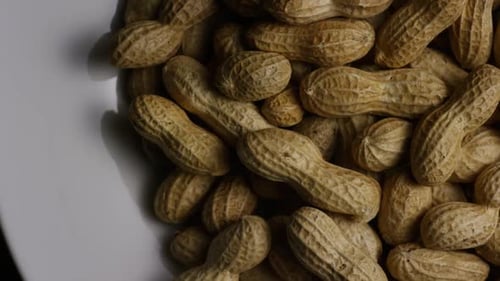 Close Up of Peanuts in Shells in Bowl