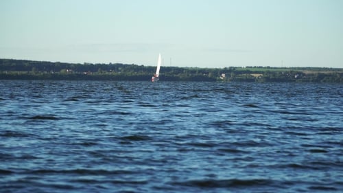 Sailboat Sailing on Lake in Daytime