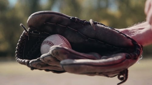 Baseball Player Tossing Ball Into Glove