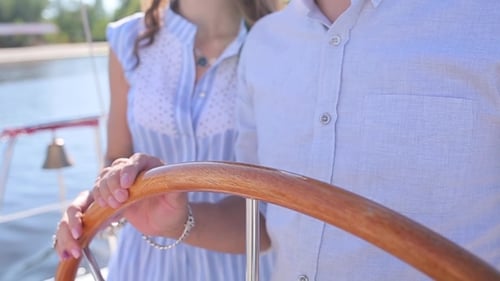 Stylish Couple Sailing Together on a Boat