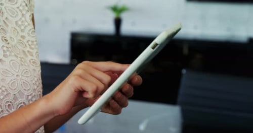 Female executive using digital tablet in the office 4K 4k