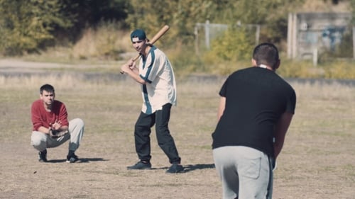 Young Men Playing Casual Game Of Baseball