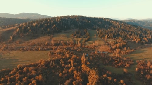 Aerial View of Golden Mountain Landscape at Sunrise
