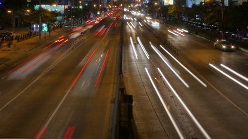 City at Night with Moving Cars