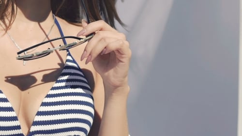 Smiling Brunette Woman Posing in Bikini on Beach