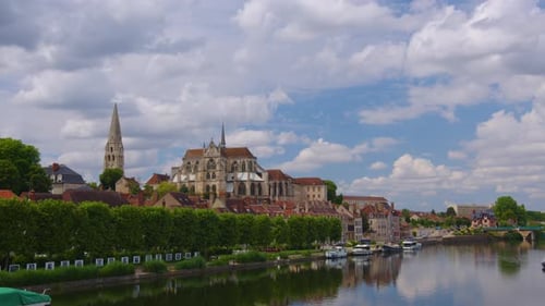 French City Landscape with River and Architecture