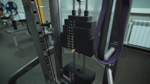 Running Standing Trainer In The Gym