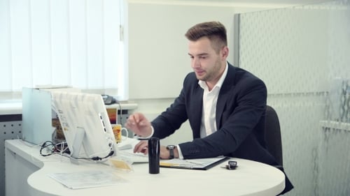 Businessman Has a Good News By The Phone