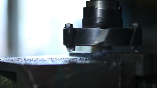 Metal Cutter at Work in Factory