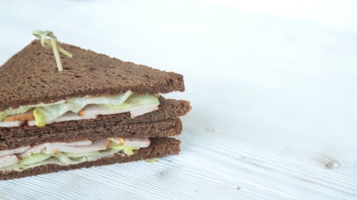 Delicious Turkey Sandwich with Lettuce on Dark Bread