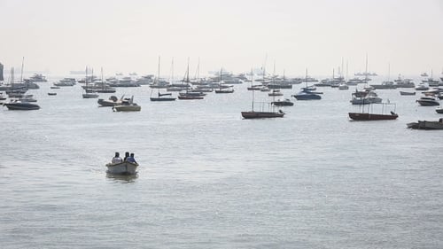 Tourist And Fisher Boats By The Harbour