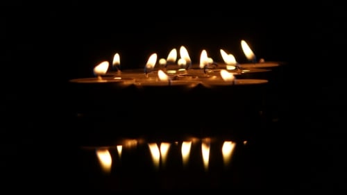 Many Burning Small Candles.