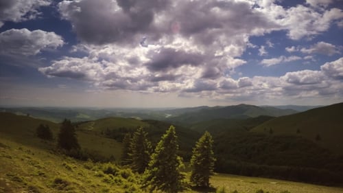 Aerial Clouds In The Nature With Green Trees
