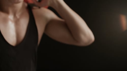 Man Bicep Workout with Orange Gym Bag