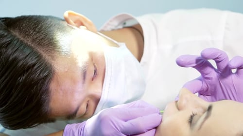 Medical Professional Providing Patient Healthcare in Clinic