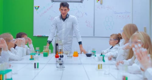 Science Class Experiment Led by Young Teacher