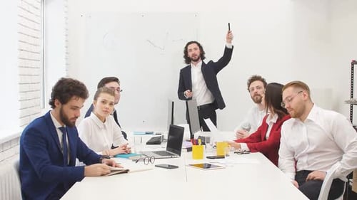 Business Presentation in a Bright Workplace Meeting