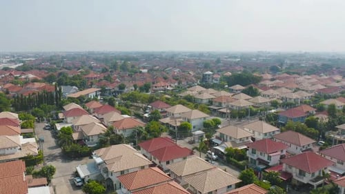Aerial view of residential neighborhood. Urban housing development from above. Top view
