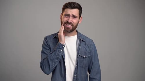 Adult Man Experiencing Tooth Pain