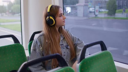 Young Woman Wearing Headphones Listening Music Funny Relax Dancing While Traveling By Bus to City