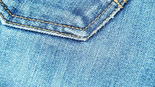 Close Up of Denim Jeans Fabric and Pocket