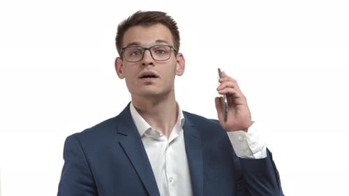 Man Talking on Cellphone, Gesturing