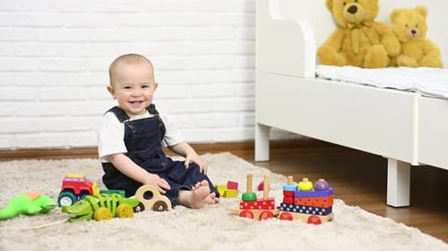 Happy Infant Playing with Colorful Wooden Toys