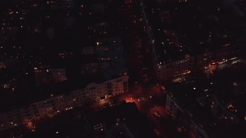 Aerial View of Evening Traffic in Streets of Urban Neighbourhood