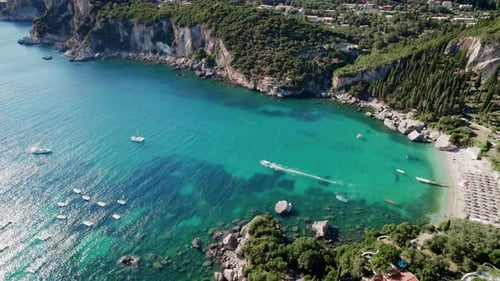 Aerial Drone View to Clear Blue Sea Water with Moored Boats and Yachts