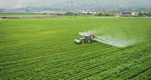 Aerial View of sprinkler at work among the cultivated fields, Beit Alfa.