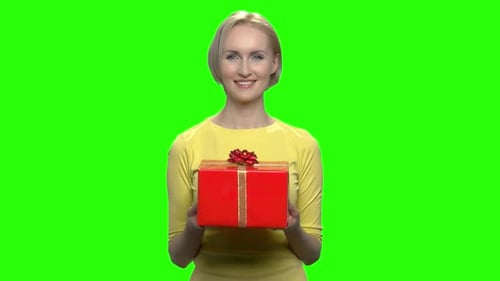 Woman Holding Red Gift Box on Green Screen