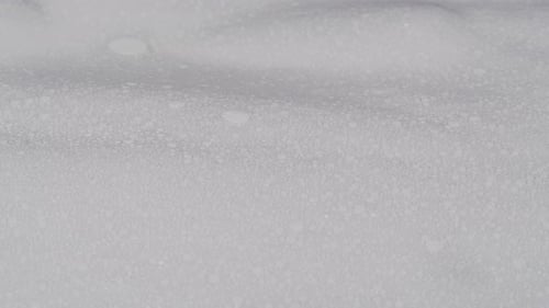 Water Drops on White Cloth Closeup