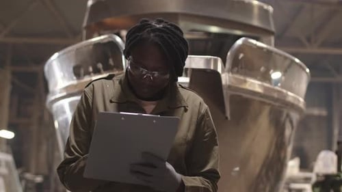 Shipyard Manager Taking Notes