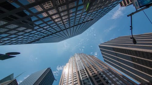 Skyscrapers and Clouds Seen From Low Angle