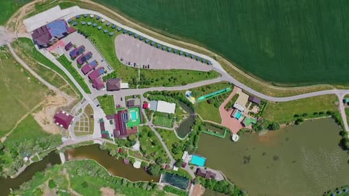 Modern resting zone. Panoramic view of a recreation complex surrounded by beautiful nature in summer