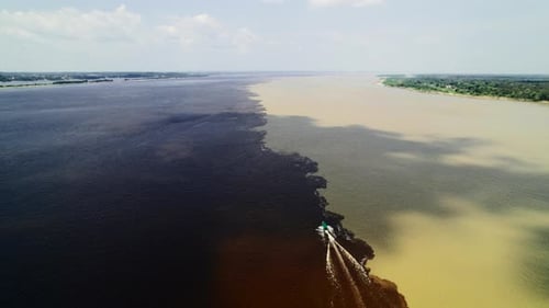 Amazon River Meets Rio Negro by Boat