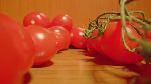 Fresh Red Tomatoes on a Wooden Surface