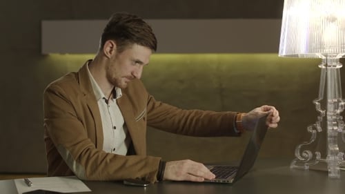 Young Man Video Conference in Workplace