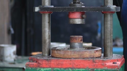 Close up of a Metal Pressing Machine