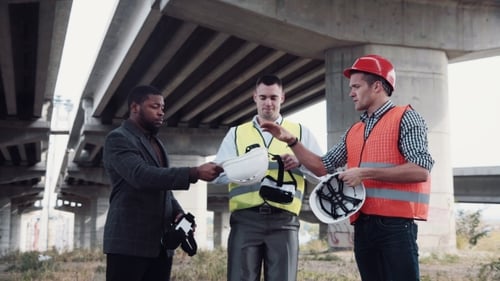 Workers And Foreman Uses Virtual Reality Glasses